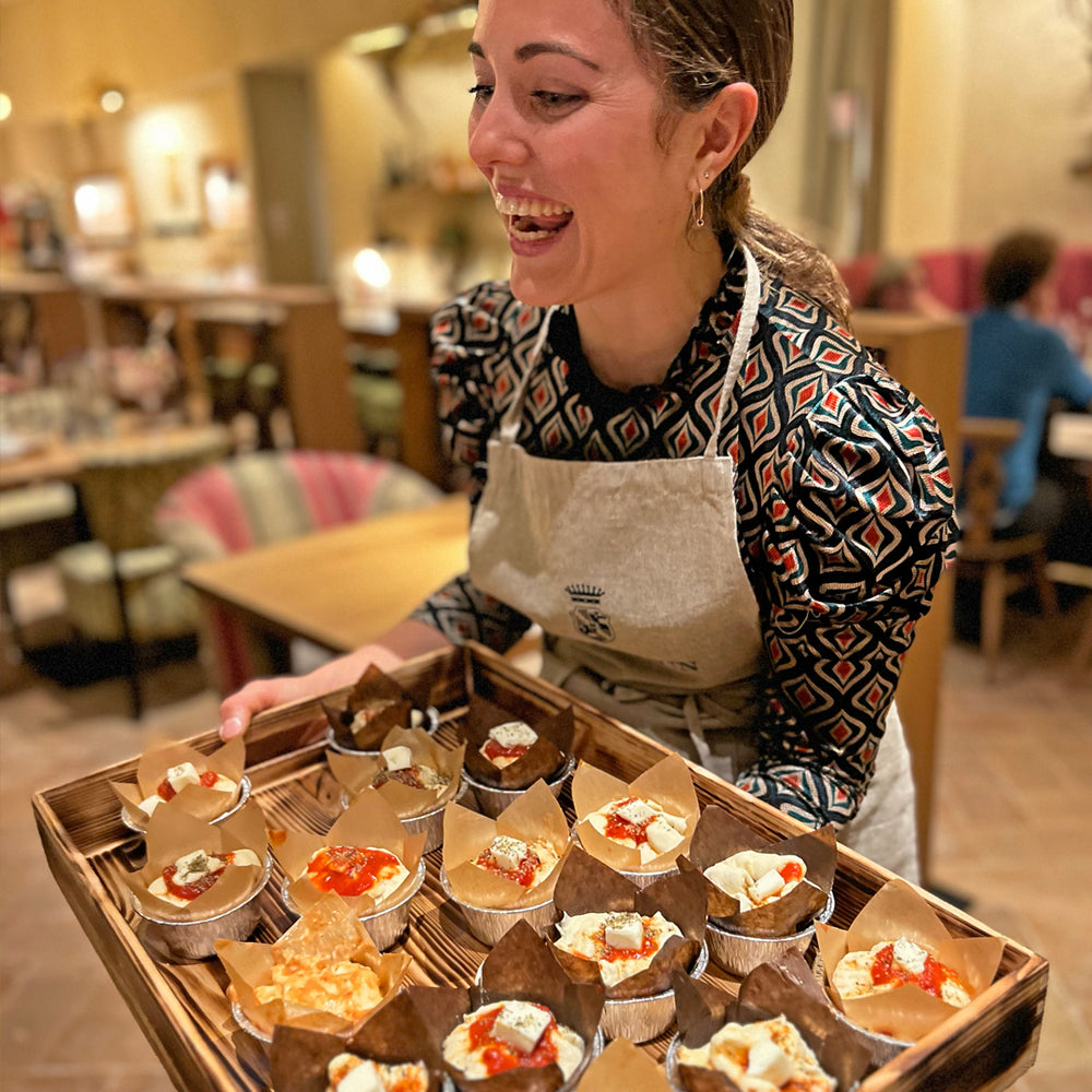 
                  
                    Christmas Cooking Class con Caterina Caramelli
                  
                